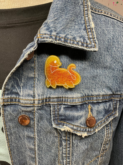 Fiery Orange Loch Ness Monster Pin