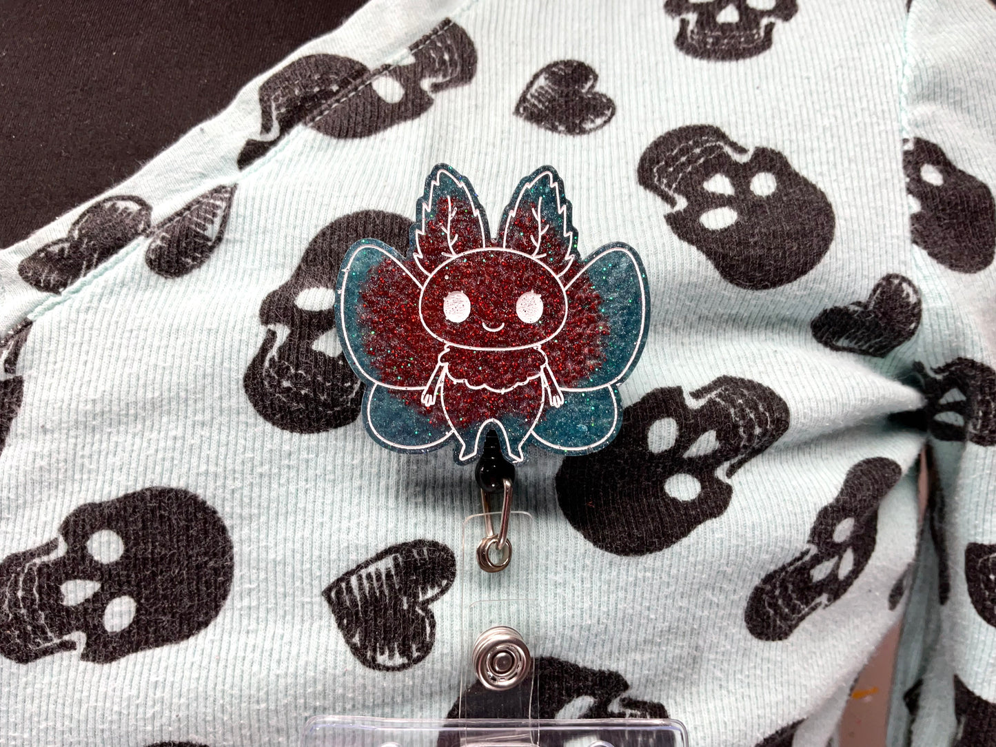 Teal & Red Mothman Retractable Badge Reel