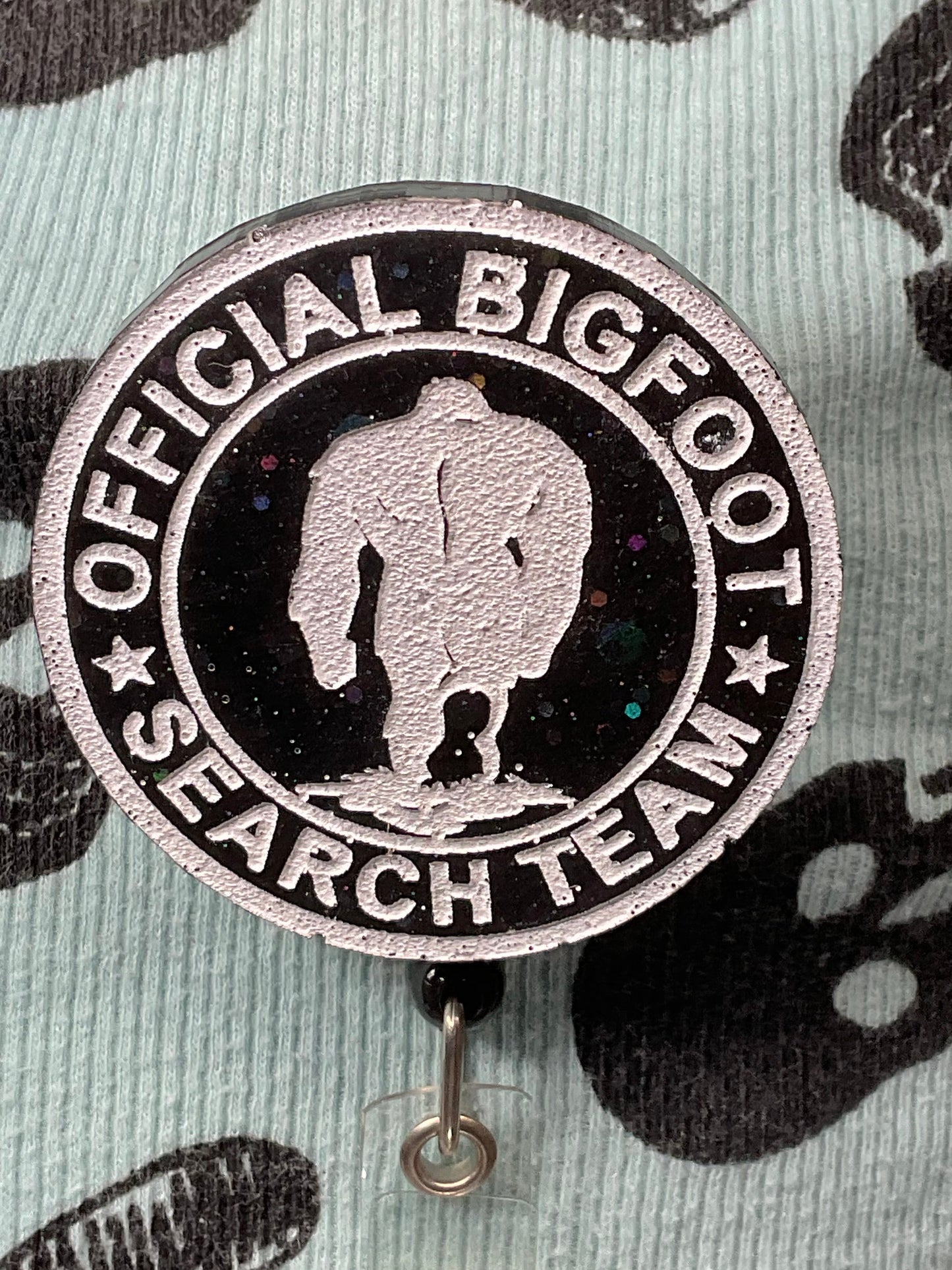 Official Bigfoot Search Team Retractable Badge Reel - Black with Holographic Glitter