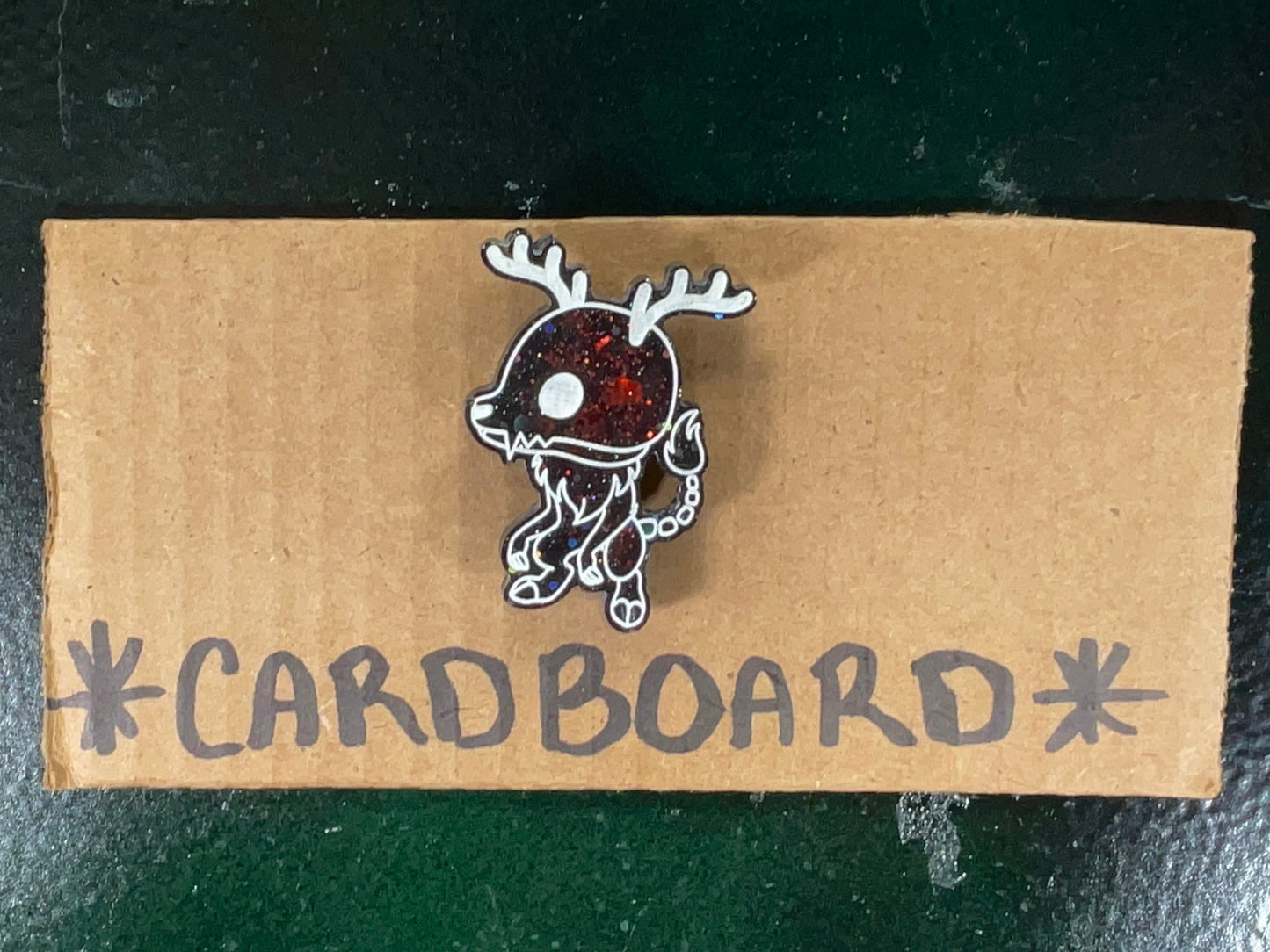 Small Black & Red Glitter Wendigo Magnet
